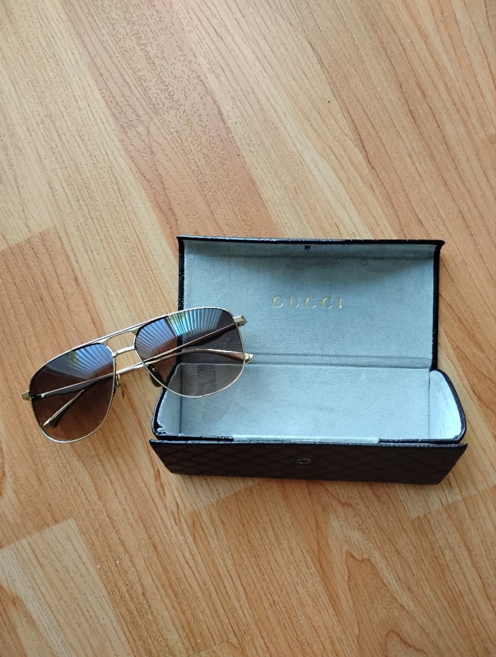 Gucci Gold Aviator Sunglasses with Brown Lenses